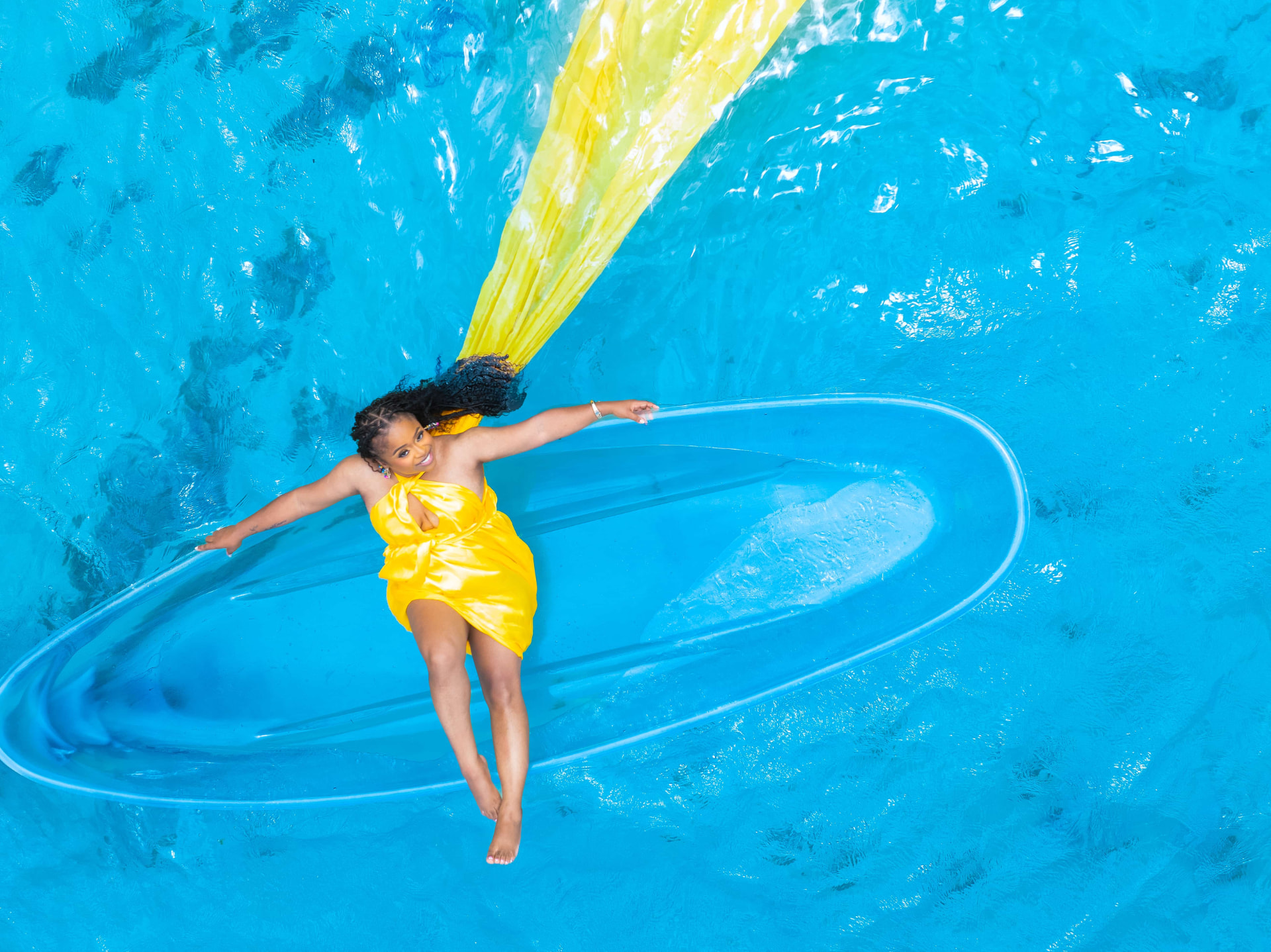 Serena floating above brilliant blue water