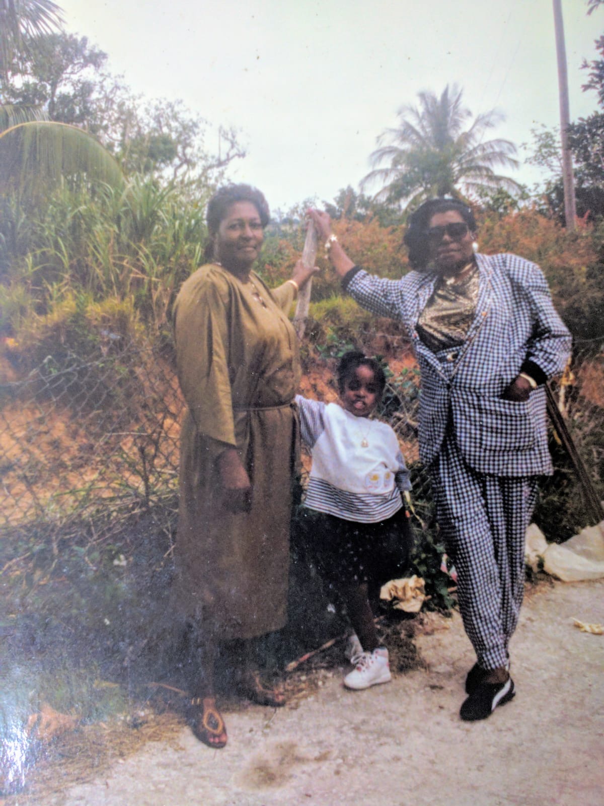 Serena as a child with her mother and grandmother